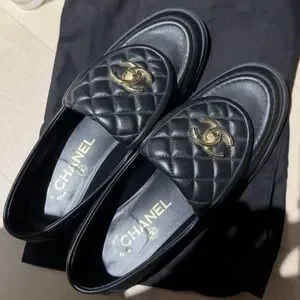 CHANEL Black Loafers with Gold Logo
